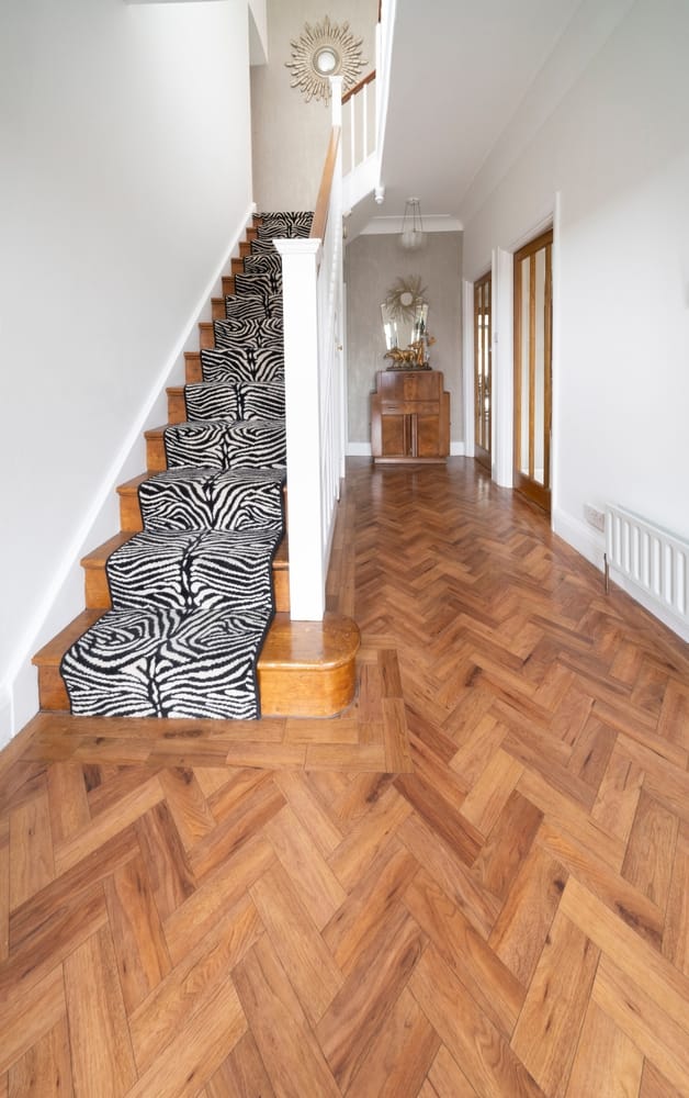 Amtico Herringbone Hallway Floor Cleaning Surrey Hallway with a herringbone wood effect Amtico floor and a staircase